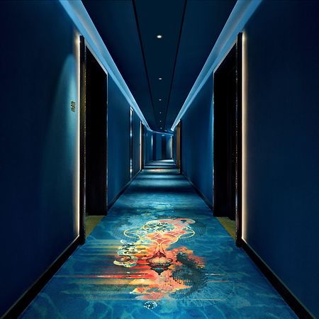 Hotel Indigo Dubai Downtown By Ihg Esterno foto The carpet in the hotel's corridors