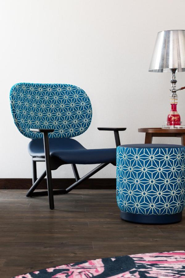 Hotel Indigo Dubai Downtown By Ihg Esterno foto Chair and stool