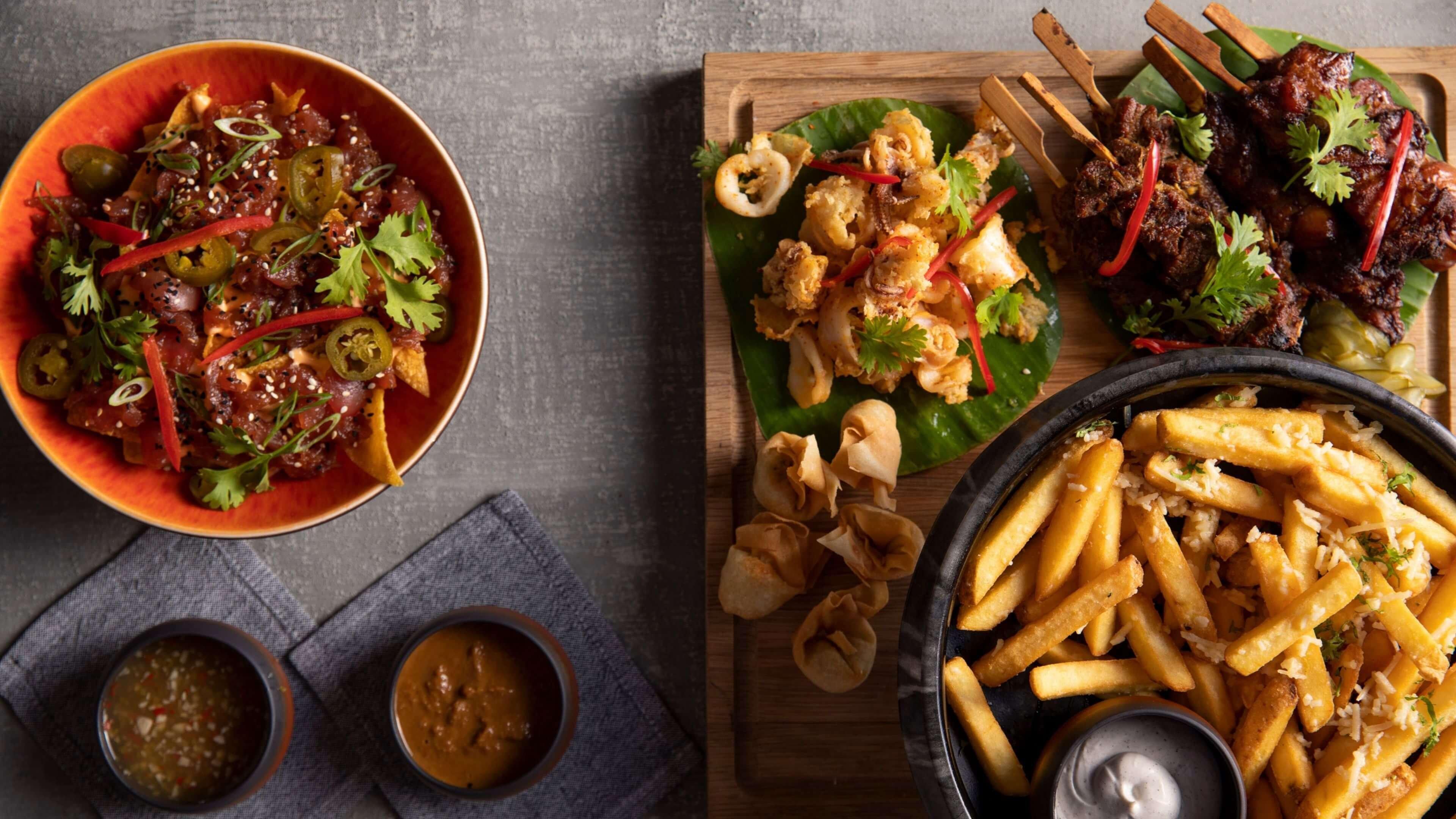 Hotel Indigo Dubai Downtown By Ihg Esterno foto A selection of dishes from the menu